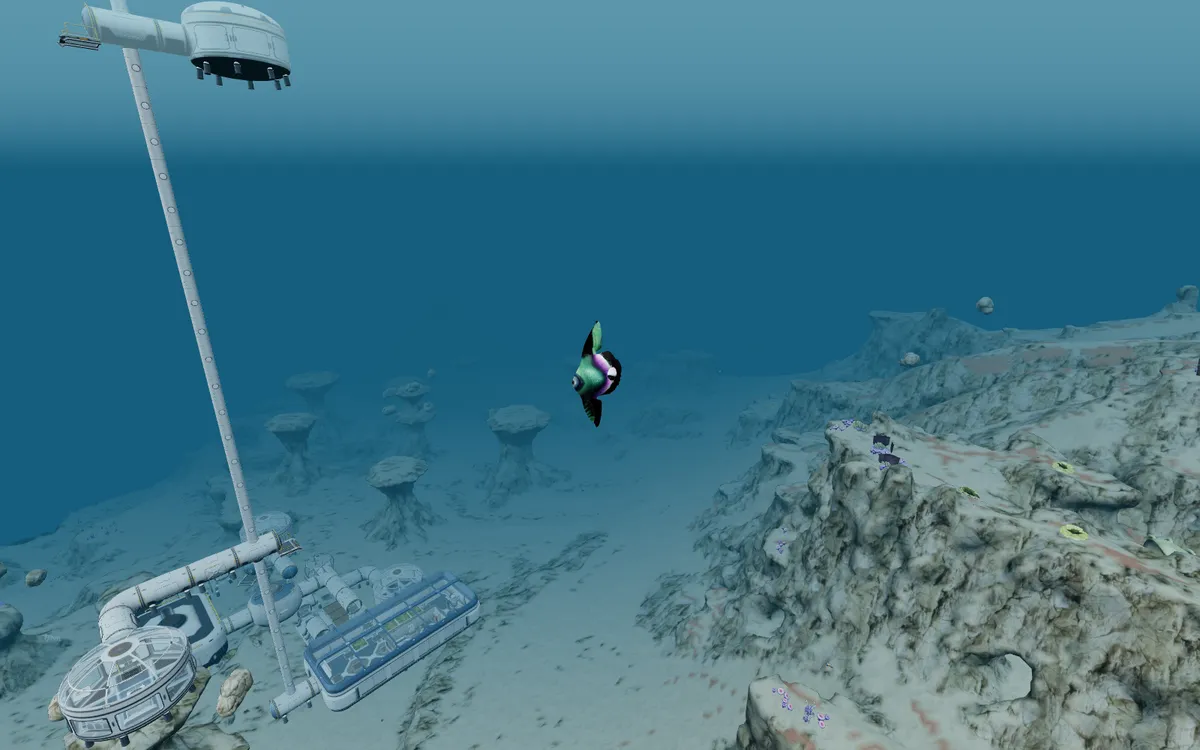 Un poisson Reginald nage devant la tour de la base
